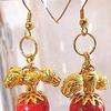 Earrings by Kay:  Red Beads are laced with Gold, Filigree Bead Caps/Fluted Gold Bead Caps/Gold Ball Beads enhanced with impressions/Gold Ear Wires.  Pendants are approximately 1 1/2" long.