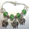 Inset shows a close up of the elephant charms.  There are three elephant charms and four green/white striped  beads with a 925 hard core center.  There are also two lovely crystal AB (aurora borealis) beads. Pandora is 