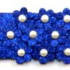 Glitzy Sapphire Blue Leather bracelet with Pearl-studded flowers.  Bracelet is approx. 8 3/4" long and 1 3/4" wide.
Size from snap to first position is approx. 8", to second position 7 1/2".   The glitter is stationary and will not shake off.