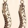 Scrolled antique silver "leaf" earrings.  Pendants are 2 1/4" long.