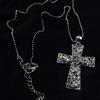 Lovely crystal rhinestone cross necklace on beaded chain.  Hangs 10" long and has an extension.
