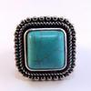 Exquisite Bali Style Turquoise/Silver Stretch Ring  
Approximately 1" Square.