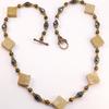 Natural Picture Jasper Gemstones are 20 MM x 8 MM or Slightly over 1" square x 1/4" thick.  Necklace by Kay features faceted iridescent black beads, Brass bead caps, antique copper rose beads, and amber AB (iridescent) bicone beads.   Rose clasp is copper.  Necklace is approx. 22" bead to bead and hangs 11"   Matching earring pendants are approx. 1 1/2" long